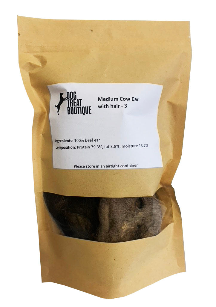 picture of 3 medium cow ears with fur in packet